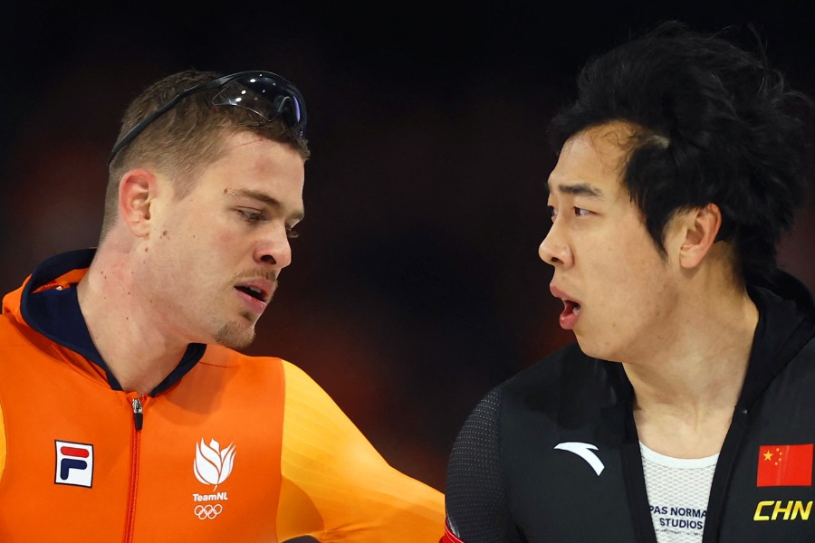 オランダのユップ・ベンネマルス（左）と中国の廉子文【写真：ロイター】