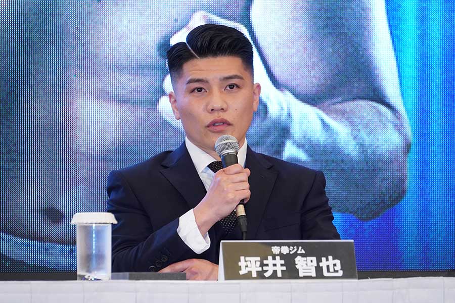 会見でコメントする坪井智也【写真:澤田直人】